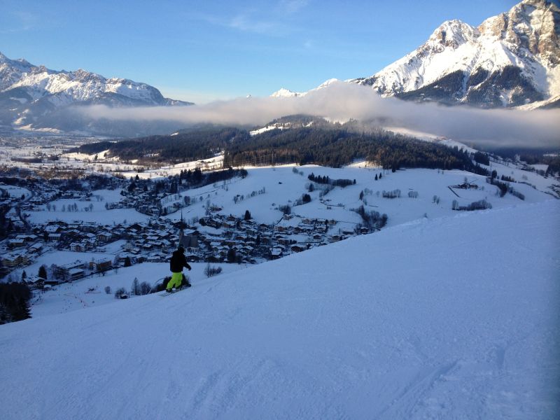 Snowboarding down to Maria Alm