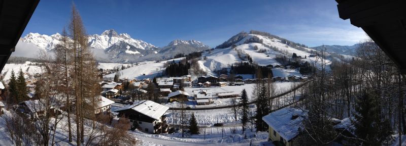 The view from the balcony in winter looking at the red ski run on Natrun